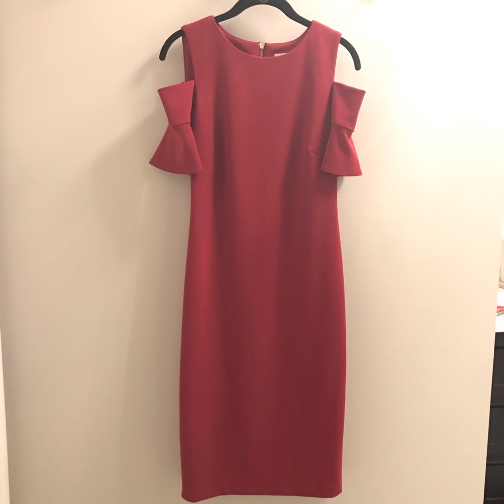 Calvin Klein open shoulder burgundy dress.